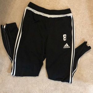 Black Adidas sweatpants
